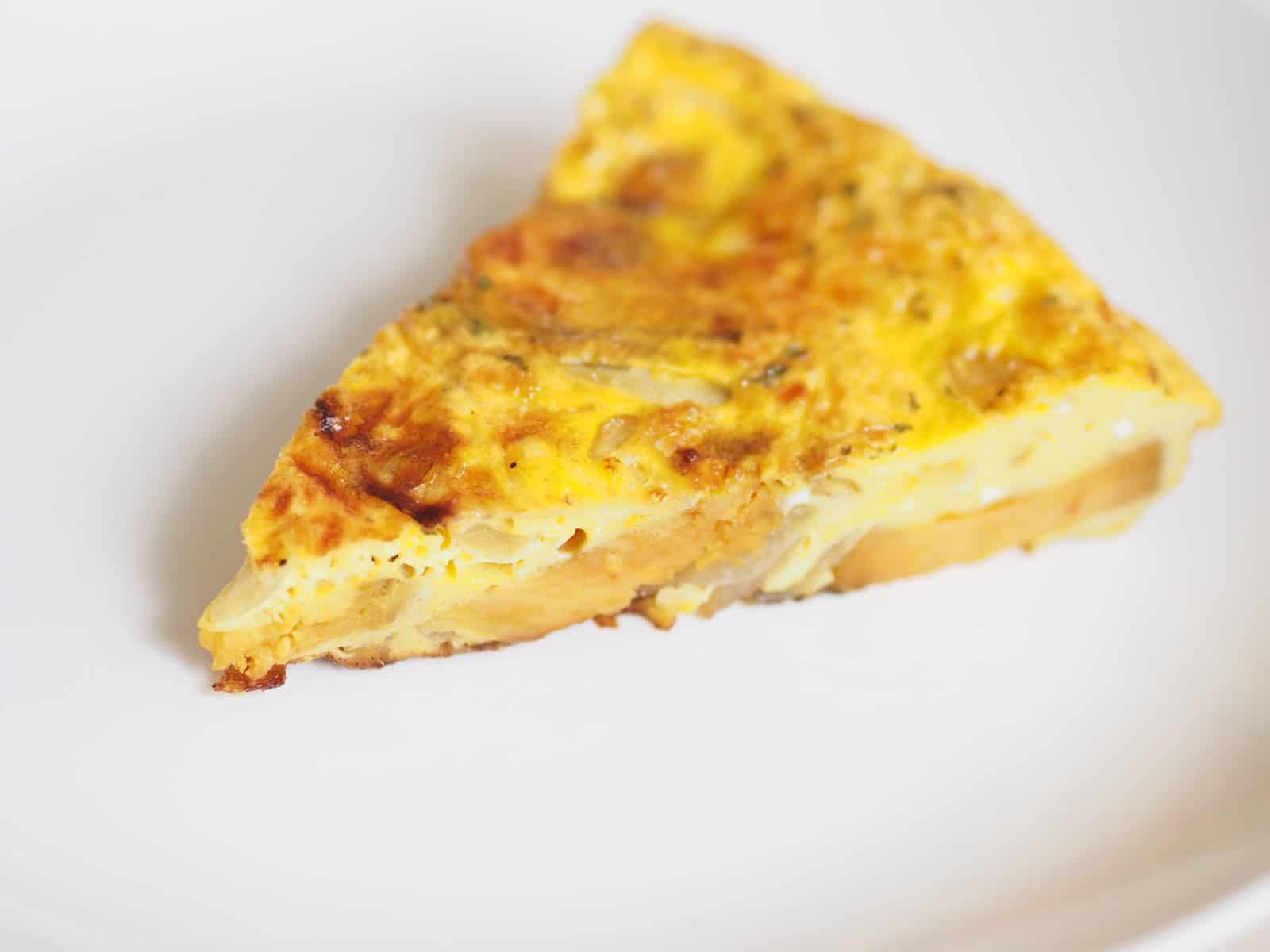 slice of Cuban tortilla - slice of Spanish tortilla - Slice of frittata